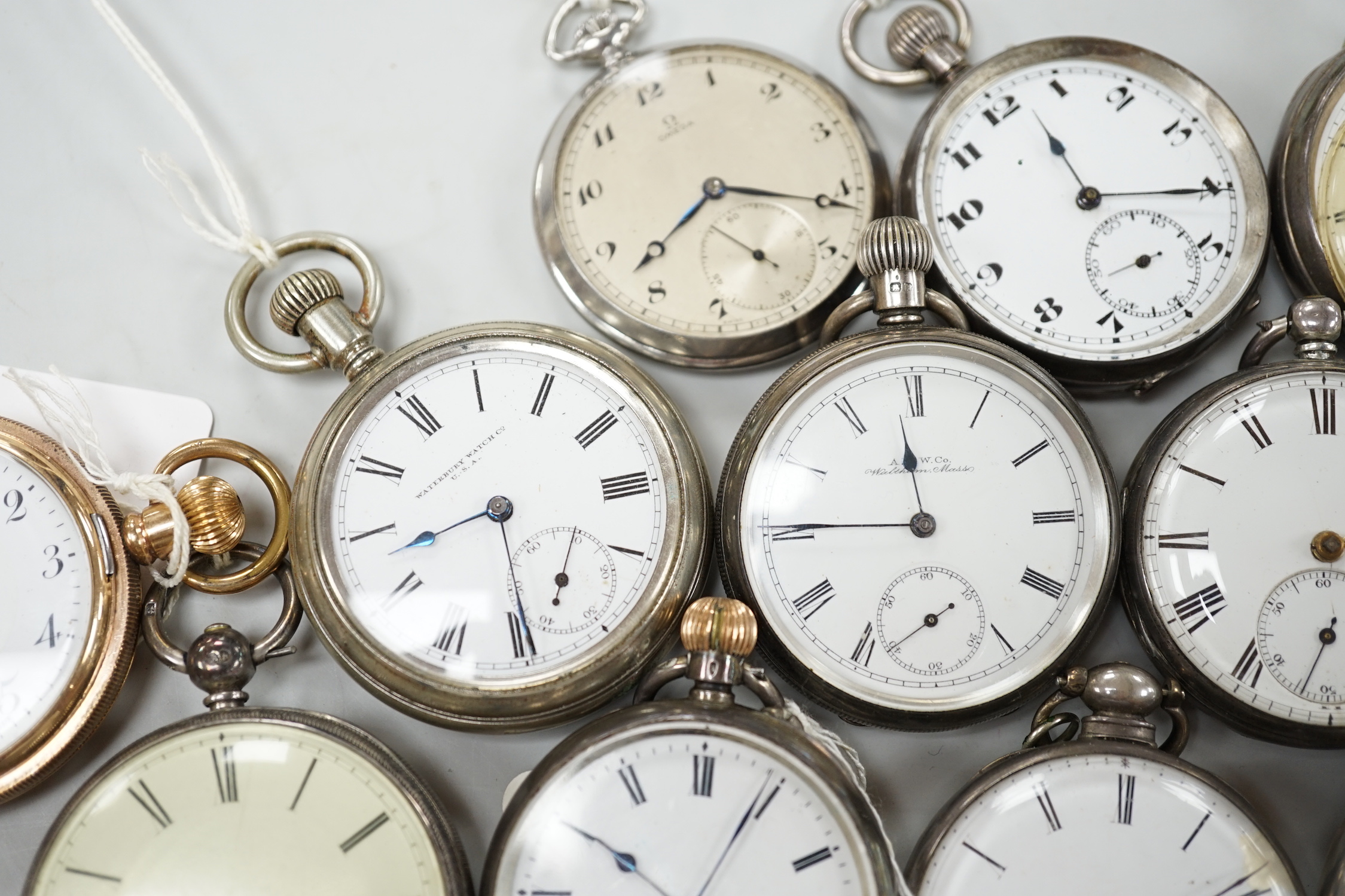 Twelve assorted silver or base metal pocket watches including chrome Omega, Searle & Co and gold plated hunter.